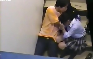 Voyeur busts a japanese pupil riding a teacher on campus !!!