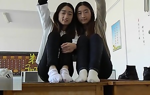 Twin Chinese girl feet tickling