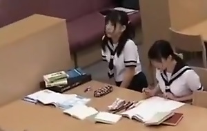 Asian schoolgirl pussy teased anent the library mainly camera