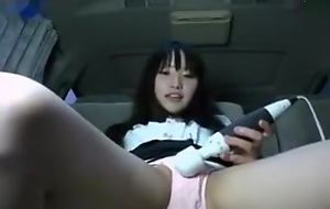I transferred her a classic Hitachi vibrator and this fresh amateur Japanese girl pleased herself in my car and squirted on cam.