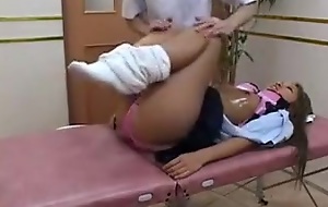 Dazzling Asian teen has a massagist working his arms on her