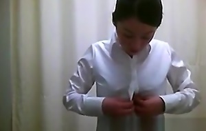 Dressing Room Spycam Shows Asian Beauties Removing A Sinistral Robe