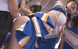 Random tramp surpassing a bus full of Japanese cheerleaders. Two gets horny and does something about it. Can't blame her.