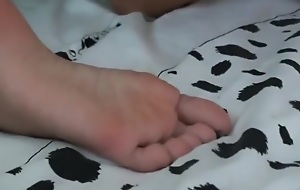 Tall Chinese lesbian licks tiny girl's feet