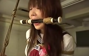 Fabulous Japanese in schoolgirlâ€™s uniform gets constrained and face fucked in kinky subjection porn sham wide a guy.