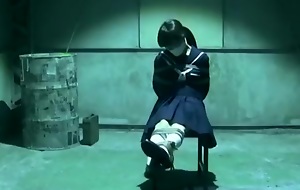 Japanese School Girl in Servitude Basement