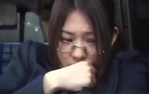 Japanese schoolgirl with glasses get fucked on bus