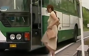 Tsukamoto alongside commuter bus molester