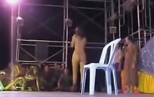 Clumsy hot Thai girl dancing naked in public event. More Clumsy carnal knowledge videos with naked girls in public