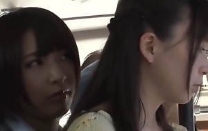 Japanese schoolgirl gropes teacher on the bus and the teacher likes it.